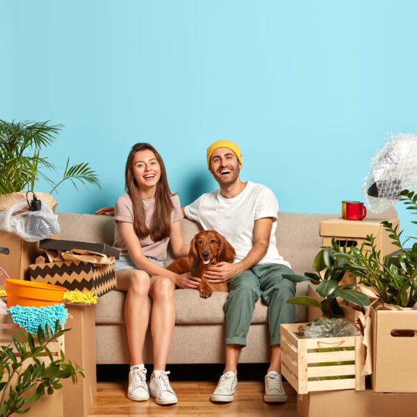 happy newlywed couple pose on sofa with favourite 2023 11 27 04 56 51 utc