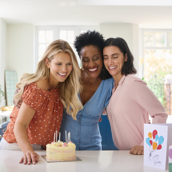 three mature women meeting at home to celebrate fr 2024 01 10 23 25 00 utc