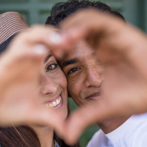 mixed race couple do hearth sign with hands looki 2023 11 27 04 58 15 utc