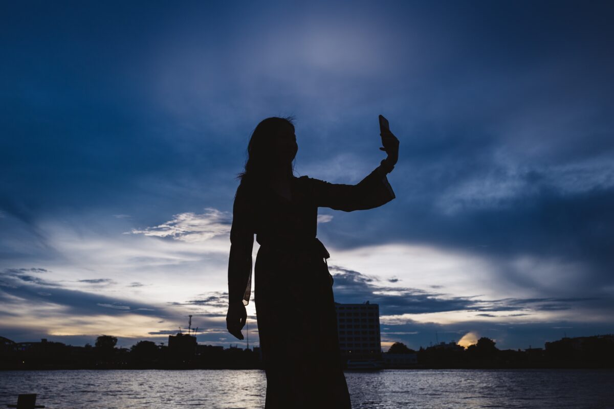shadow of woman taking selfie with mobile phone in 2025 01 07 15 51 09 utc